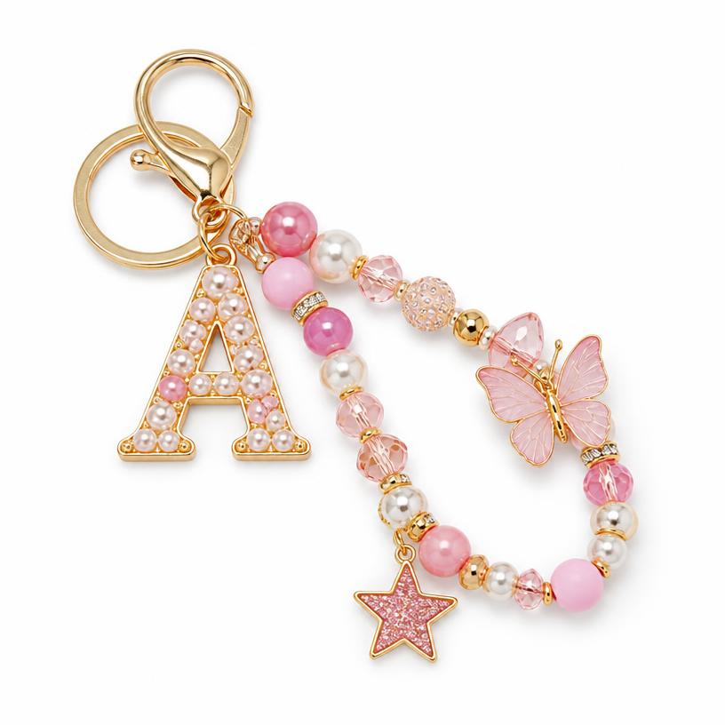 Bag charm personalizado con inicial, mariposa y estrella